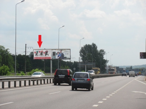 Фото рекламной плоскости по адресу Новообуховская трасса (Днепропетровское шоссе), в направлении из г. Киев, левая