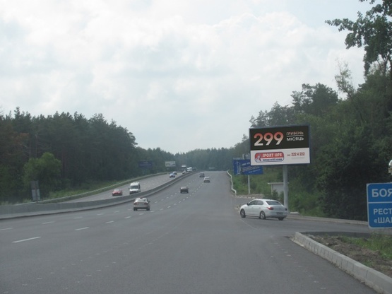 Фото рекламной плоскости по адресу Одесская трасса, в направлении с.Глеваха, 20м после мотель-ресторана  "Шале", 9км+300метров