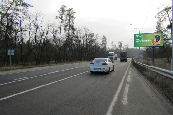 Фото рекламної площини за адресою Минский просп., в направлении в г. Киев, (супермаркет "Фальконе"), 15км+370