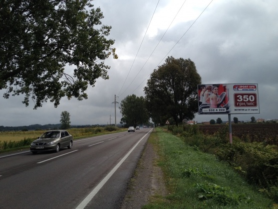 Фото рекламной плоскости по адресу Кольцевая дорога (Автодорога М10 Львов- Краковец), км 13+100, 500 м до гостиницы "Панська оселя"