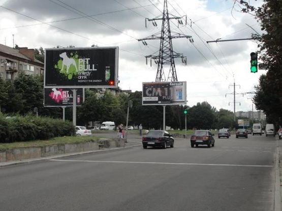 Фото рекламной плоскости по адресу Поля пр. - Стромцова ул., из центра