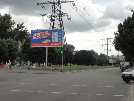 Фото рекламной плоскости по адресу Поля пр. - Стромцова ул., из центра