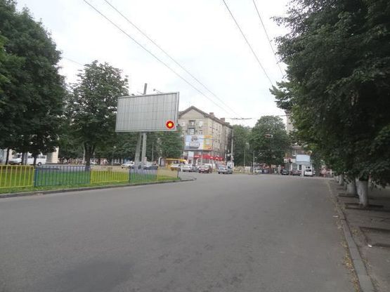 Фото рекламной плоскости по адресу Поля пр. - Титова ул., из центра