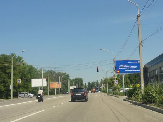 Фото рекламной плоскости по адресу Запорожское шоссе, 53б, призматрон въезд в город