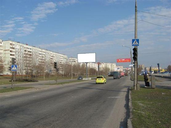 Фото рекламной плоскости по адресу Набережна магістраль  – вул.Фортечна, (гаражі), напр.руху до вокзалу (призматрон)