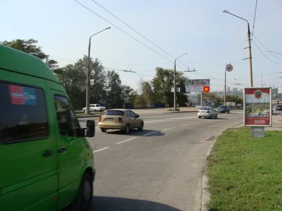 Фото рекламной плоскости по адресу вул.Б.Хмельницького — виїзд на ДніпроГЄС, напрямок з центра, ст.Б (призматрон)