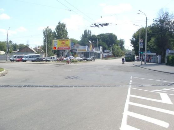 Фото рекламной плоскости по адресу пр.Соборний-вул.Космічна - вул.Шенвізьська (призматрон)