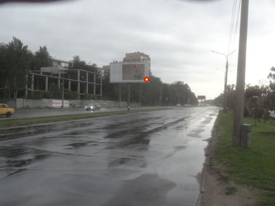 Фото рекламной плоскости по адресу Набережна магістраль  – вул.Нижнедніпровська,(призматрон) напрямок руху до вокзалу