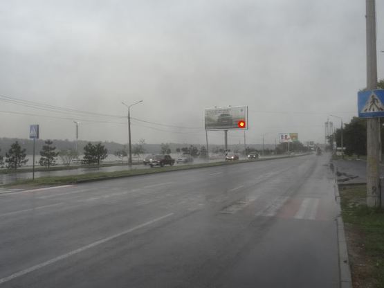 Фото рекламної площини за адресою Набережна магістраль  – вул.Нижнедніпровська(призматрон), напрямок руху до порту