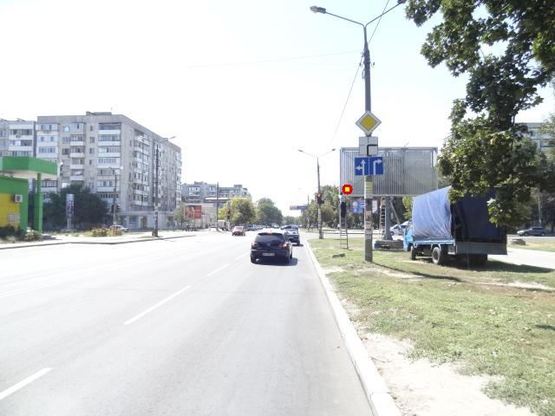 Фото рекламної площини за адресою вул.Шкільна - вул.Фортечна , ст.А (призматрон)