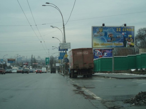 Фото рекламной плоскости по адресу Дружбы Народов бульвар (площадь ГВОВ) за АЗС "АNP" (остановка)