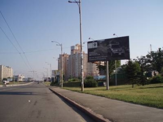 Фото рекламної площини за адресою Палладина проспект (заезд на Победы проспект)