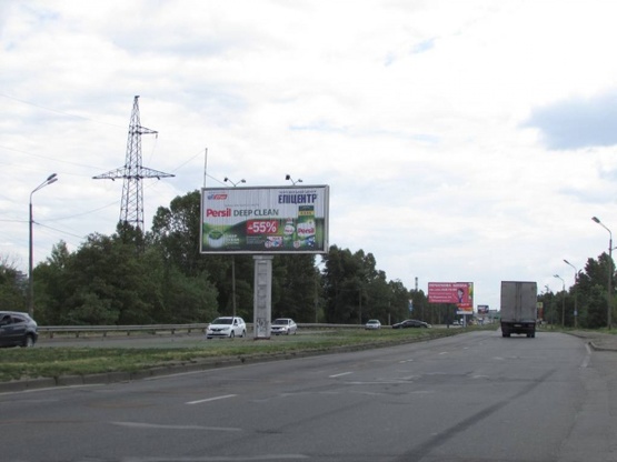 Фото рекламной плоскости по адресу Богатирська 1А, (розподілювач), Автосалон Mitsubishi/Peugeot,  рух в напрямку Петрівки