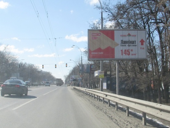 Фото рекламной плоскости по адресу Глушкова Академіка проспект, 30 (рух на виїзд із Киева)