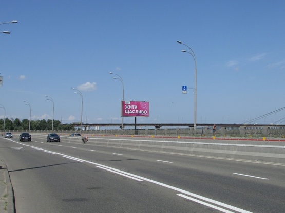 Фото рекламной плоскости по адресу Набережно-Рибальська дорога, (200 метрів  від Петрівського мосту) рух в напрямку Оболоні