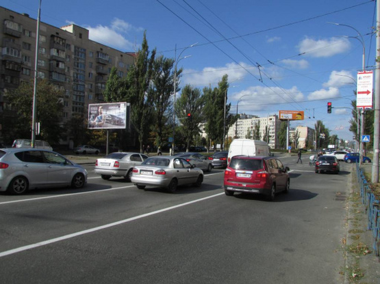 Фото рекламной плоскости по адресу Героїв Сталінграду проспект, 3/12 (світлофор) напрямок руху від проспекту Степана Бандери, ліворуч