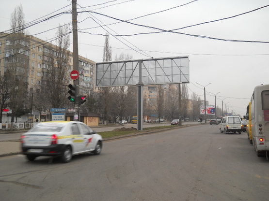 Фото рекламной плоскости по адресу Днепропетровская дорога №70 правая В1