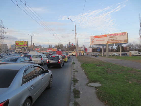 Фото рекламной плоскости по адресу пр-т М.Жукова №3а правая А1