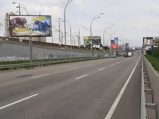 Фото рекламной плоскости по адресу Дарницкий мост, раздельтель №1 из центра