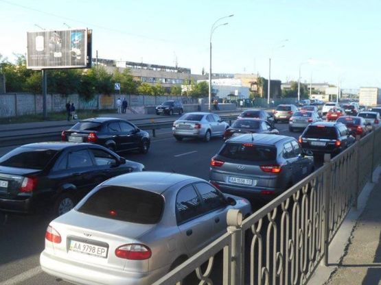 Фото рекламной плоскости по адресу Набережно-Рыбальская ул. - Подольско-Воскресенский мост от Подола