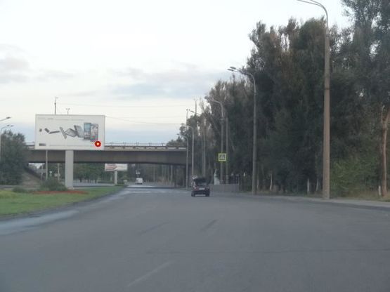 Фото рекламной плоскости по адресу Заводская Набережная ул., Кайдакский мост, из центра