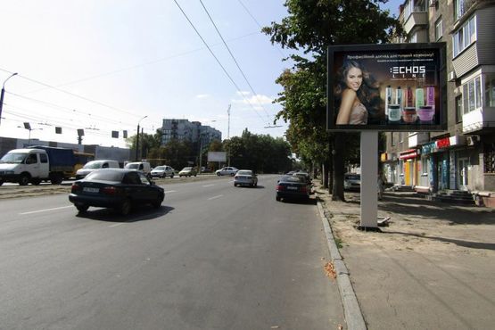 Фото рекламної площини за адресою m046A,просп. Богдана Хмельницького - вул. Титова, 1 (РЕКЛАМНЫЙ МАТЕРИАЛ ТОЛЬКО ПОЛИМАН)