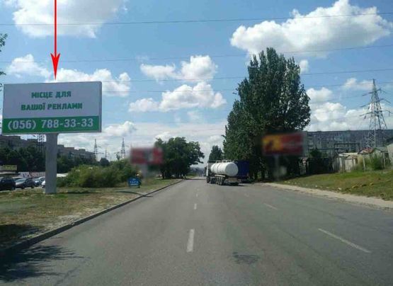 Фото рекламной плоскости по адресу t023A1,Донецьке шосе, розподільча смуга, в районі буд. №124, рух у бік ж/м Ломівський