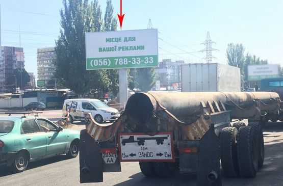 Фото рекламной плоскости по адресу t046A1,Донецьке шосе - вул. Березинська, навпроти ТРЦ "Караван", на розділовій смузі