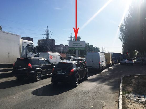 Фото рекламної площини за адресою t047A1,Донецьке шосе - вул. Березинська (на розділовій смузі), біля ТРЦ Караван, на світлофорі, рух у бік ж/м Ломівський