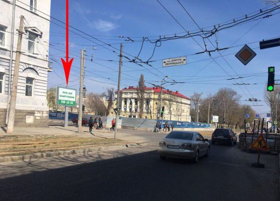 Фото рекламной плоскости по адресу t049B,просп. Дмитра Яворницького - просп. Гагаріна, рух у бік набережної перед пехрестям на світлофорі