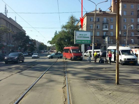 Фото рекламной плоскости по адресу t204B,пл. Старомостова навпроти буд. №12, на зупинці