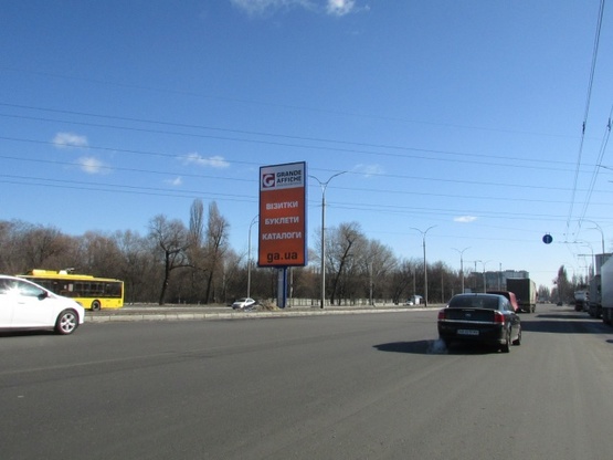 Фото рекламной плоскости по адресу Академіка Заболотного, 44 (розподілювач) рух від Одеської площі
