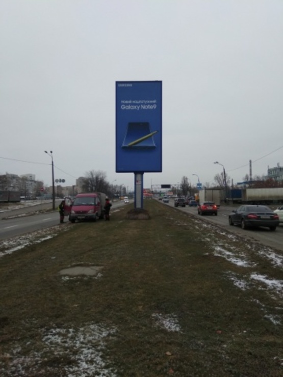 Фото рекламной плоскости по адресу Богатирська, 2 розподілювач, рух до Киева, навпроти пив.з-д."ОБОЛОНЬ"