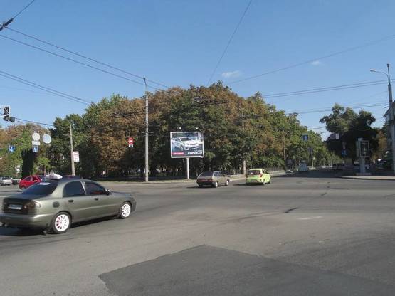 Фото рекламной плоскости по адресу просп. Мира х ул. Щорса призма 3х4 (грань 1)