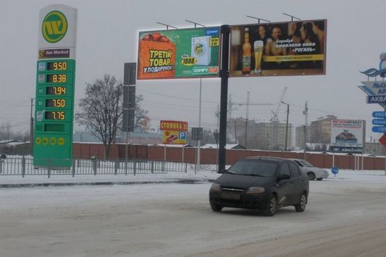 Фото рекламной плоскости по адресу Довженка вул. - Сухомлинського вул. (з центру, ліва)