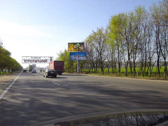 Фото рекламной плоскости по адресу Кольцевая дорога, 50 м до въезда на рынок "Столичный"(нижняя пл.)