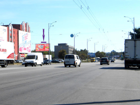 Фото рекламной плоскости по адресу ул.Братиславская,52, м-н "Б-52", "АТЛ", напрвл. на рынок Юность