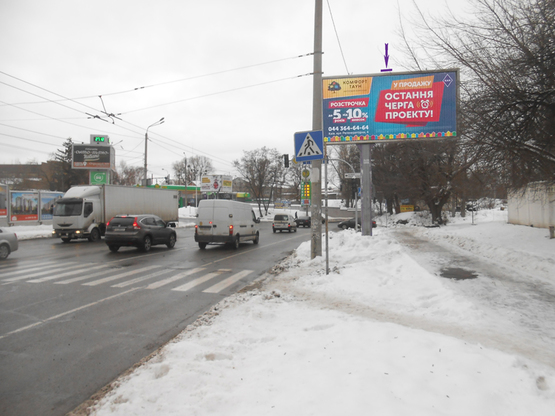 Фото рекламной плоскости по адресу пр. Отрадный, напротив 103