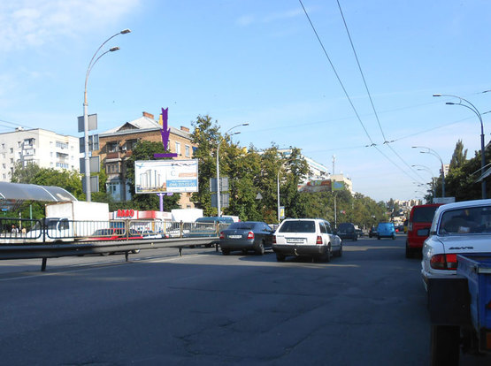 Фото рекламной плоскости по адресу бул.Чоколовский,9,/ рынок, направление  на пр.Победы (призма)