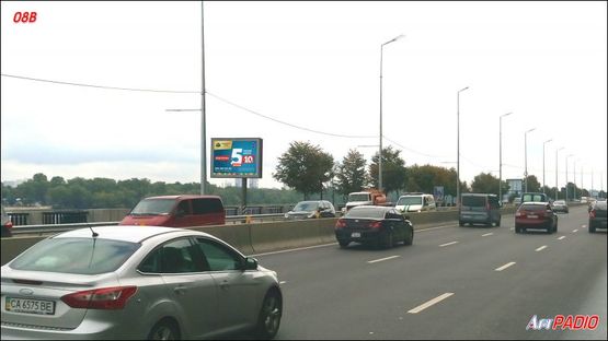 Фото рекламной плоскости по адресу Наб. шоссе, за Пешеходным мостом, к ст.м.Днепр