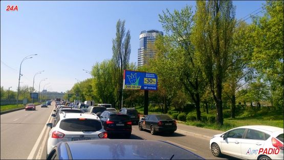 Фото рекламної площини за адресою Броварской пр., между МВЦ и АЗС "WOG", в центр