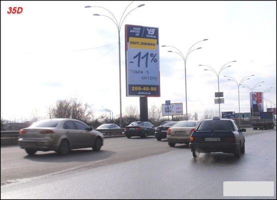 Фото рекламной плоскости по адресу Дарницкое шоссе, к Дарницкому мосту, разделитель