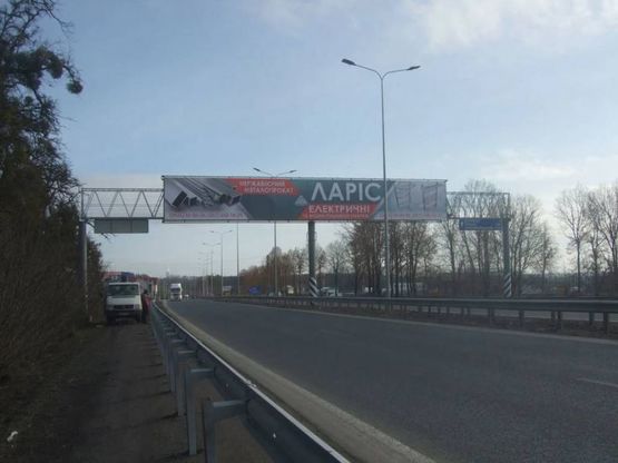 Фото рекламной плоскости по адресу Хмельницкая трасса (Якушинцы) въезд правая