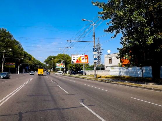 Фото рекламной плоскости по адресу Запорізьке шосе - вул. Генерала Пушкіна, призма/Запорожское шоссе - ул. Генерала Пушкина, призма, ТЦ Дафи, МакДональдс