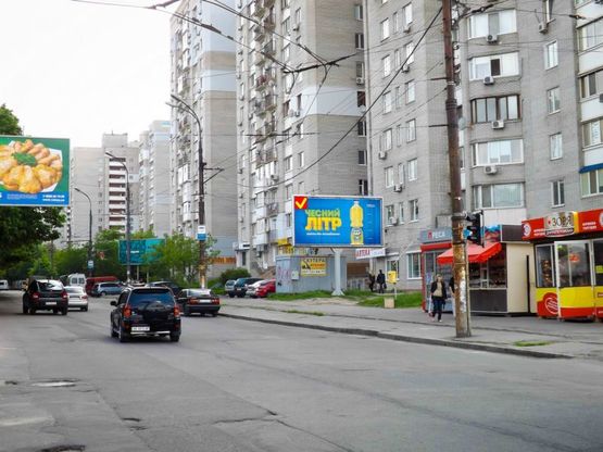 Фото рекламної площини за адресою вул. Рабоча - вул. Уральська, призма/ул. Рабочая - ул. Уральская (супермаркет "Алькон"), призма