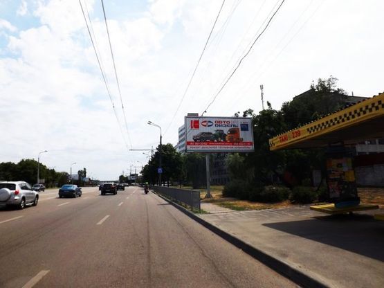 Фото рекламной плоскости по адресу вул.Наб.Заводська - вул.Павлова/ул.Наб.Заводская - ул.Павлова, перекресток, светофор, транспортная развязка, поток движения в сторону Амурского моста