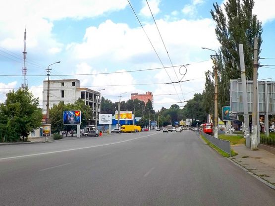 Фото рекламної площини за адресою пр-т. Гагаріна - вул. Ласточкіна, "Укрсиббанк", бэк-лайт 4х3/пр. Гагарина - ул. Ласточкина, "Укрсиббанк", бэк-лайт 4х3