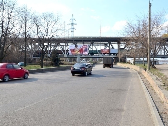 Фото рекламной плоскости по адресу вул. Січеславська Набережна, Амурський міст, район річкового вокзалу, з центру (Беклайт 4х8)/ул. Набережная Ленина, Амурский мост, район речного вокзала, из центра (бэклайт 4х8)