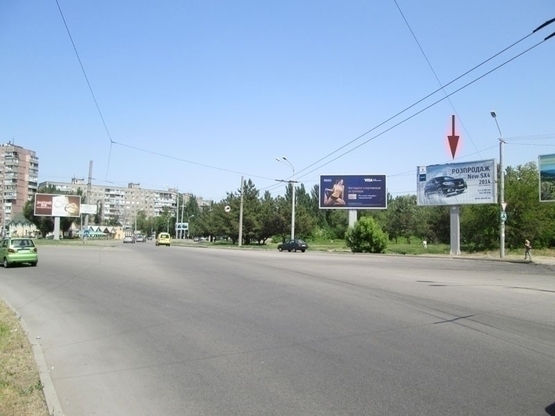 Фото рекламної площини за адресою вул. Набережна Перемоги - пл. Перемоги, кільце, рух з пр. Героїв і вул. Космічної в центр (Беклайт 4х8)/ул. Набережная Победы - пл. Победы, кольцо, движение с пр. Героев и ул. Космической в центр (бэклайт 4х8)
