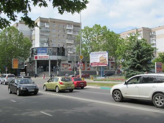 Фото рекламной плоскости по адресу перекрёсток пр.Мира, ул.1Мая, №36-А